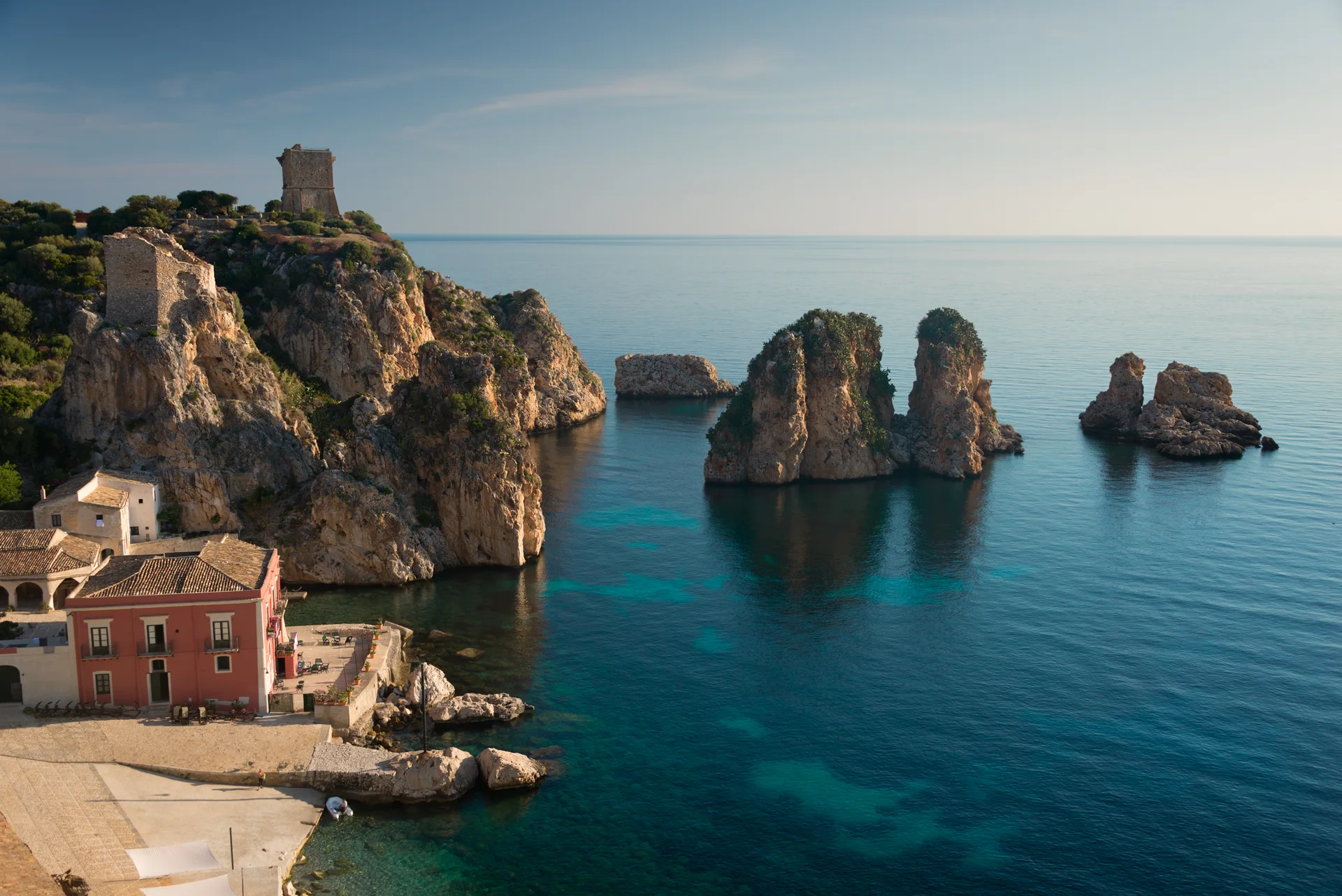 Sicilian sea stacks and coastal village